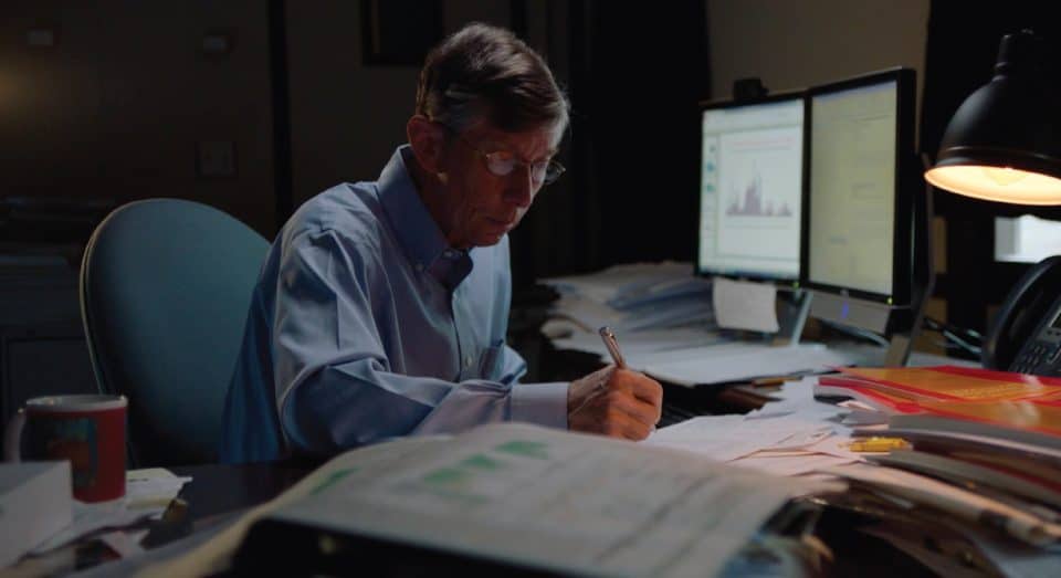 Warrington faculty, Jay Ritter working at his desk