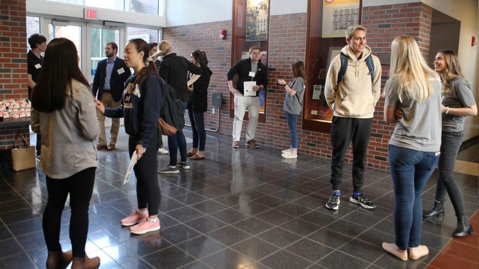 Students interacting in Gerson Hall