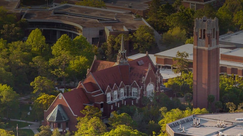 Aerial view of the UF campus including the University Auditorium and Century Tower