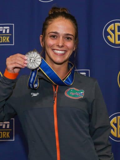 Emma Whitner UF of the diving team holds an SEC medal