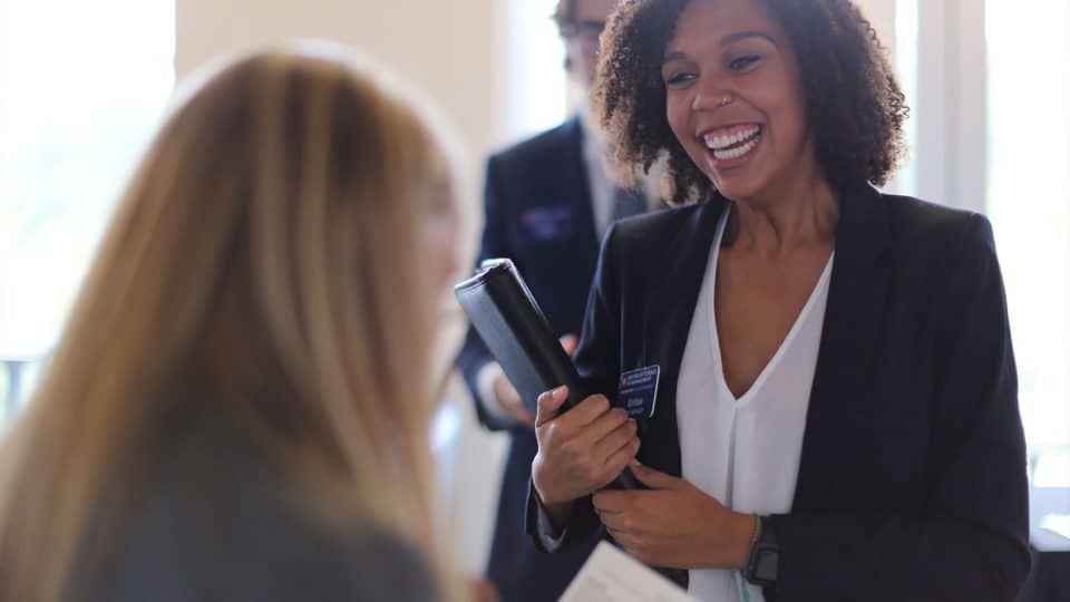 Students and employers networking at an event