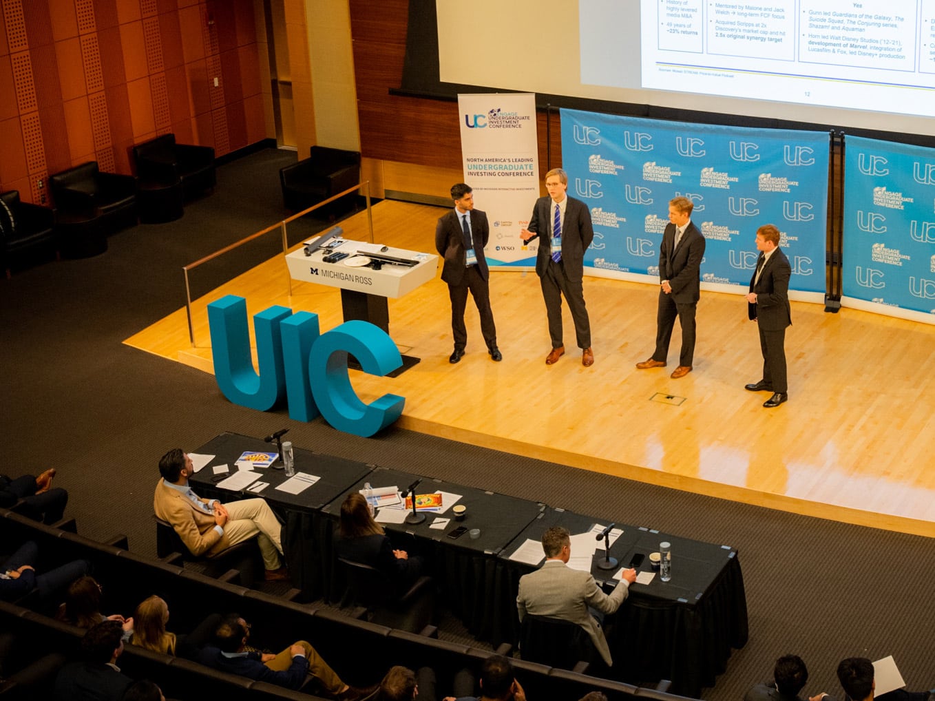 Students present at a stock competition