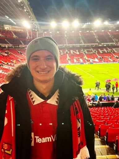 Jacob Fatovic in a stadium in fan gear