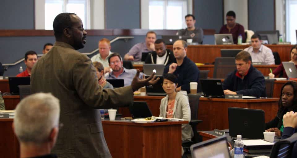 Stephen Asare speaks to students in a classroom