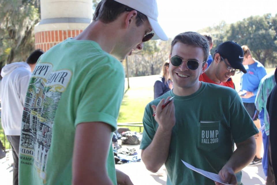 two BUMP members explaining something