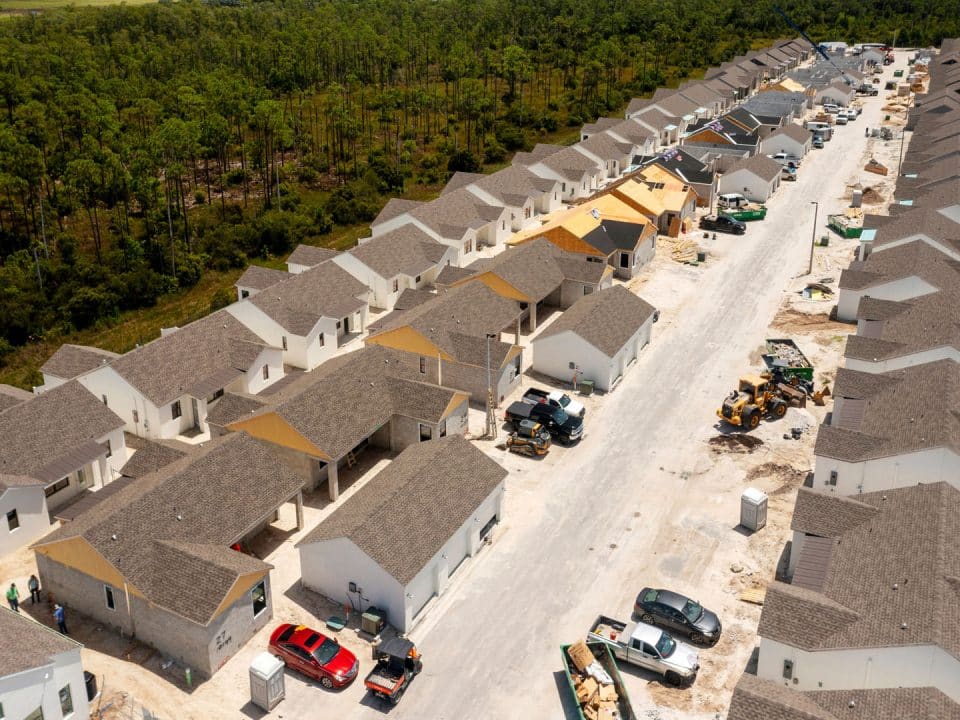 The construction of Odyssey by Solutra in Fort Myers is a neighborhood of tightly spaced small homes for rent