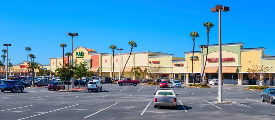 A shopping center in New Port Richey with quite a few empty spaces