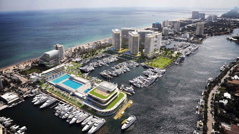 An aerial view artist rendering of Bahia Mar Yachting Center with condo towers and renovated hotel on adjacent land