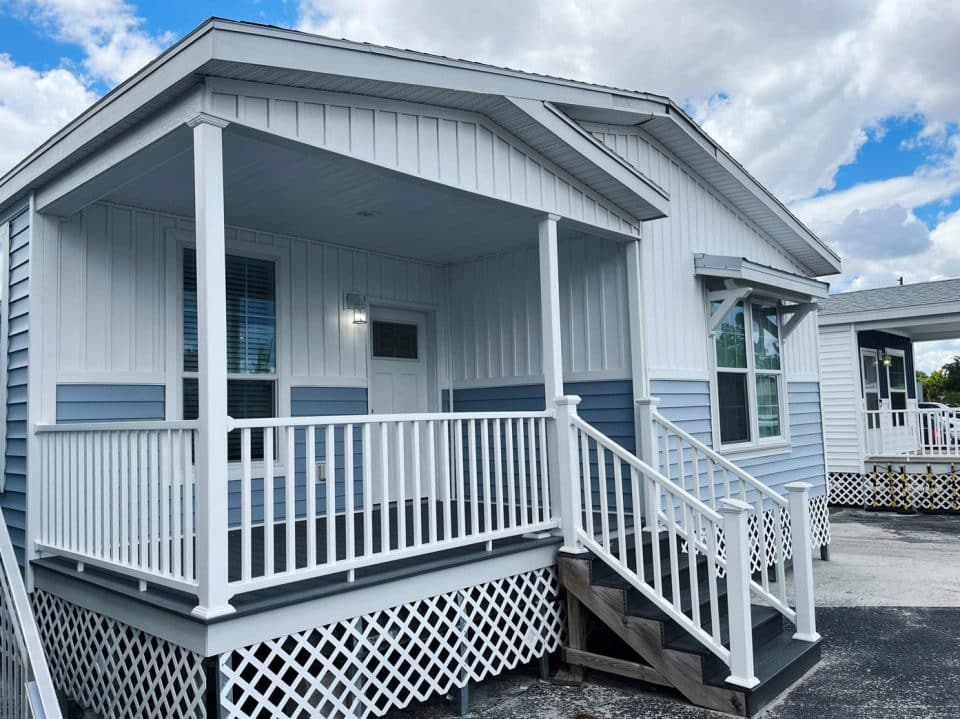 Model mobile home with a covered porch