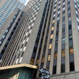 Looking up at skyscrapers from street-level