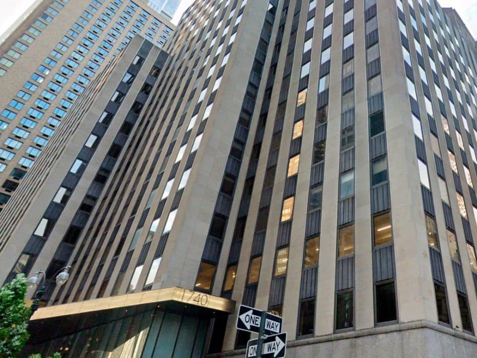 Looking up at skyscrapers from street-level