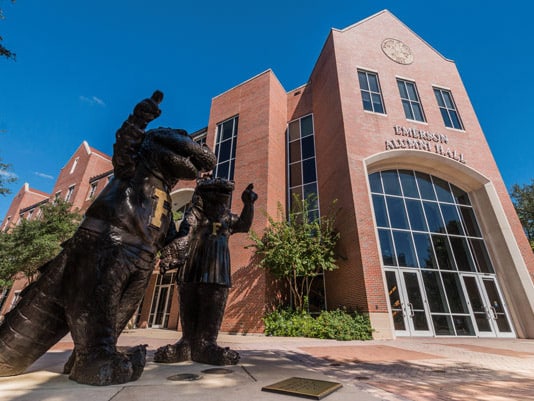 Alumni Hall with Albert and Alberta statues in the forefront