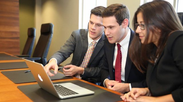 GSIF students in working in a conference room