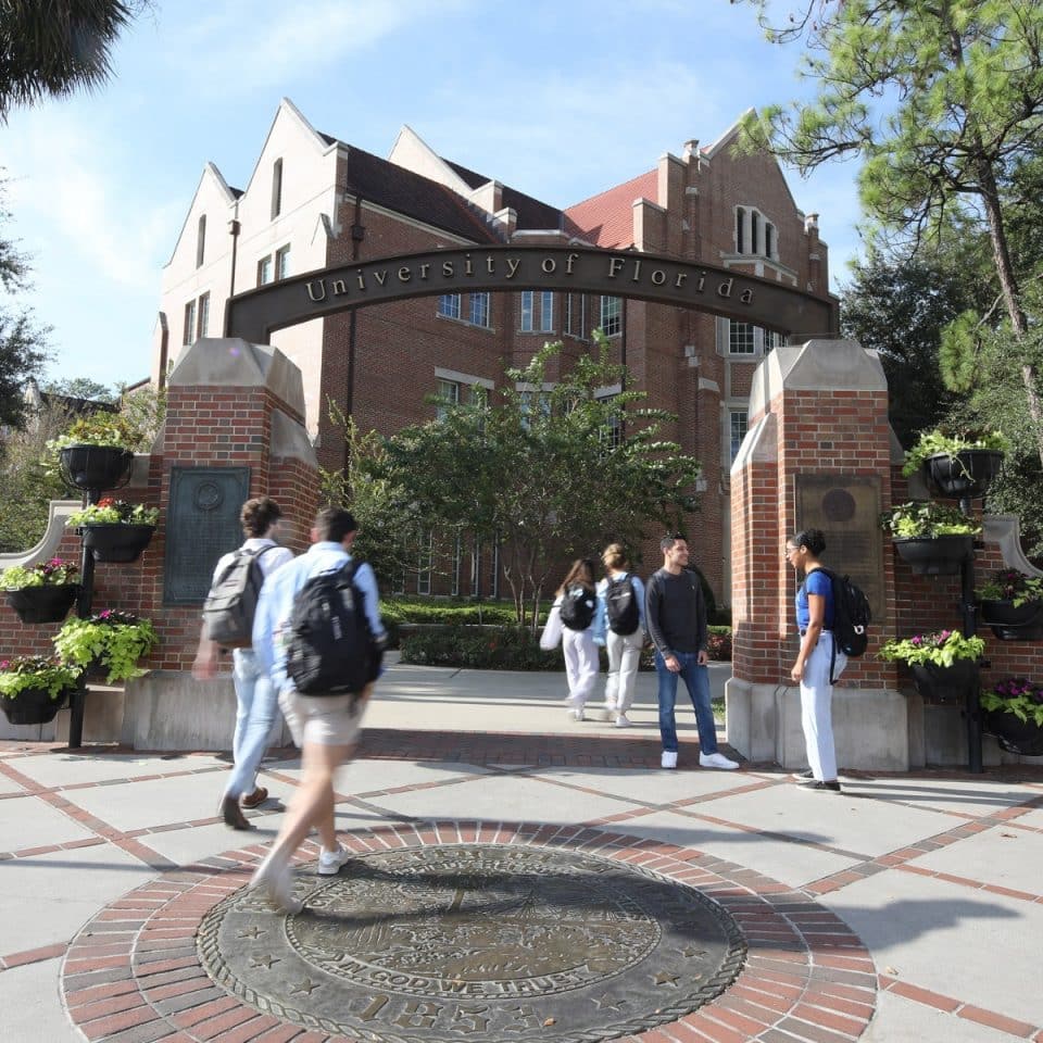 Heavener Hall behind the University of Florida gateway