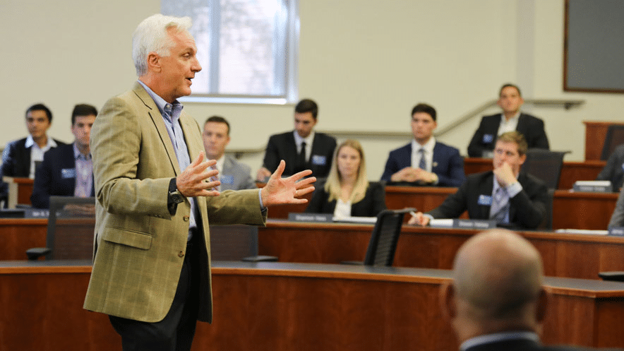 David Ling speaks to students in a classroom