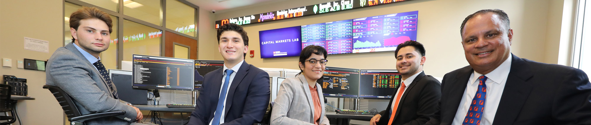 Students in the Capital Markets Lab with Eddie Sanchez