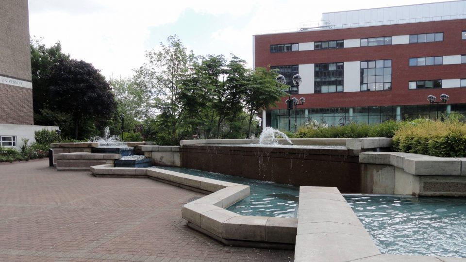 Fountains and buildings on Aston Business School campus, Birmingham, England