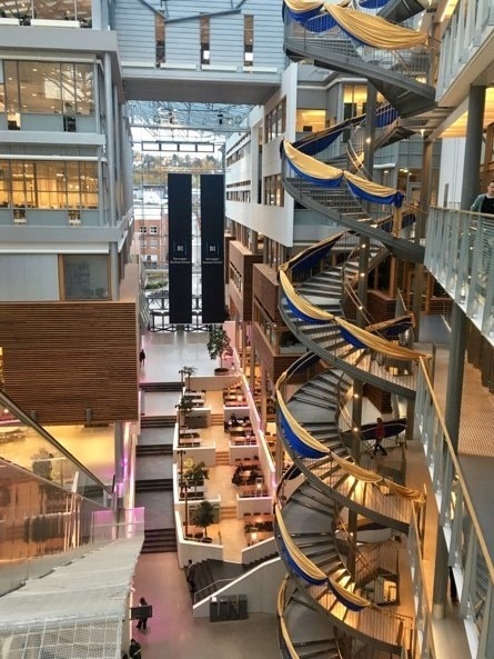 Modern-style university campus building with circular staircase