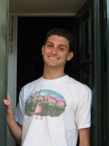 Student, Zachary, in a doorway in Rome.