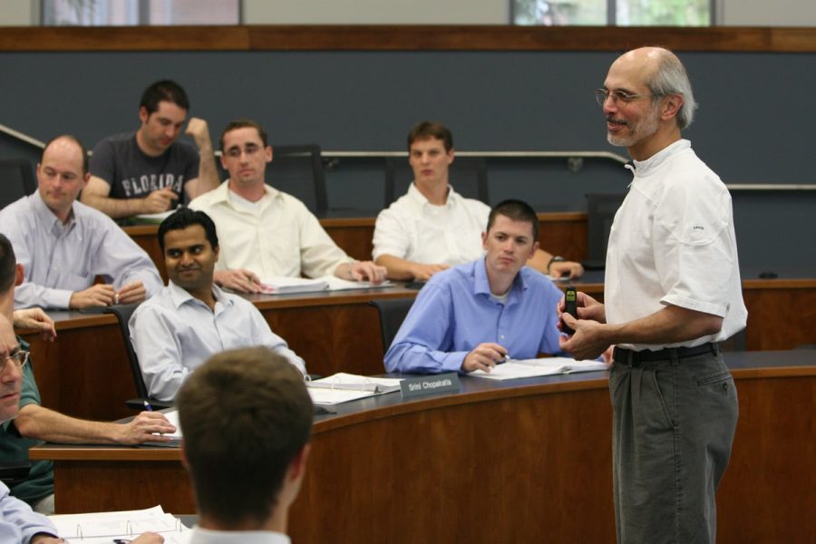 Joe Alba talks to students in class