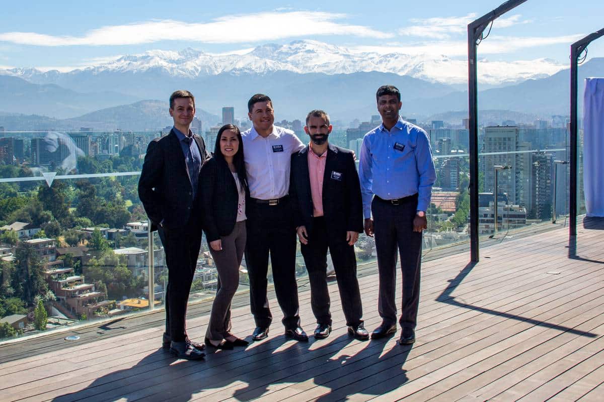 UF MBA South Florida students in Santiago, Chile with the city and mountains in the background
