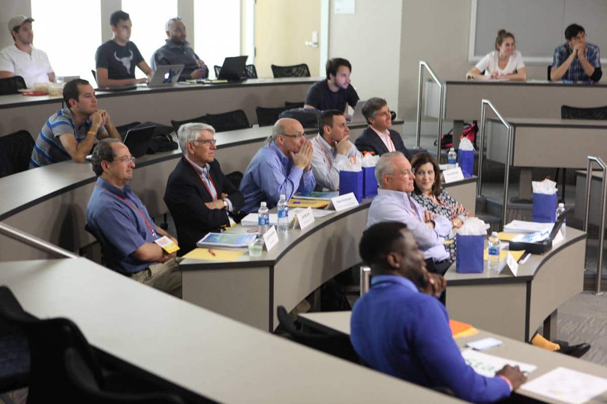 Bruce Brandes sits among the judges at the Big Idea Competition