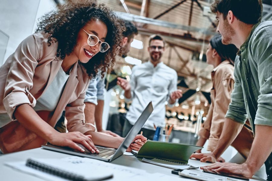 Group of young business people working in a modern office.