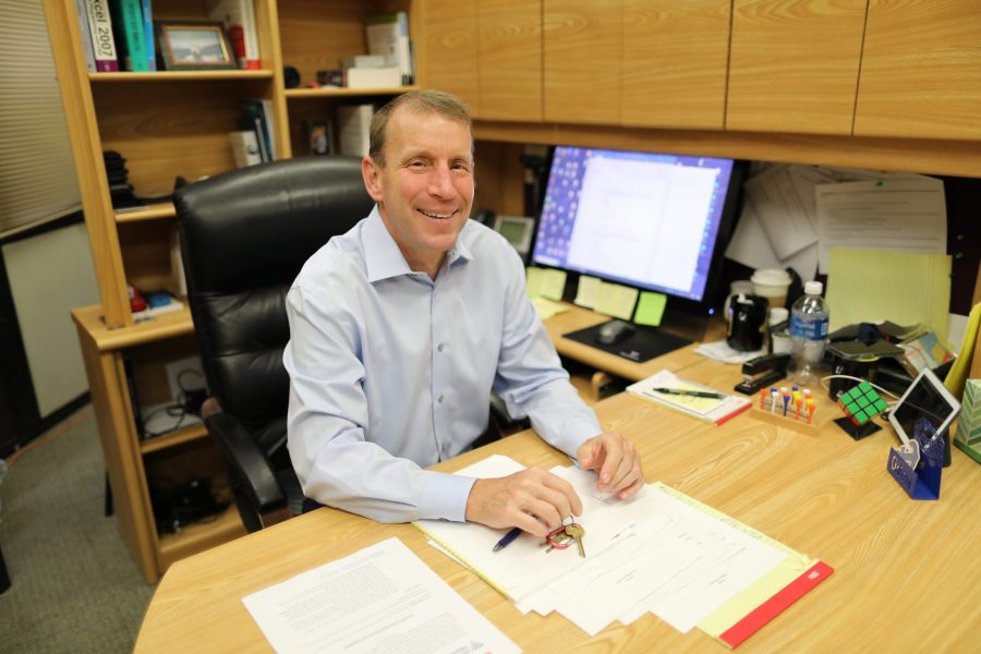 John Banko sitting at his desk.