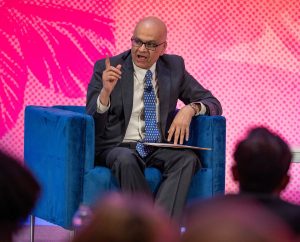 Saby Mitra speaks on stage