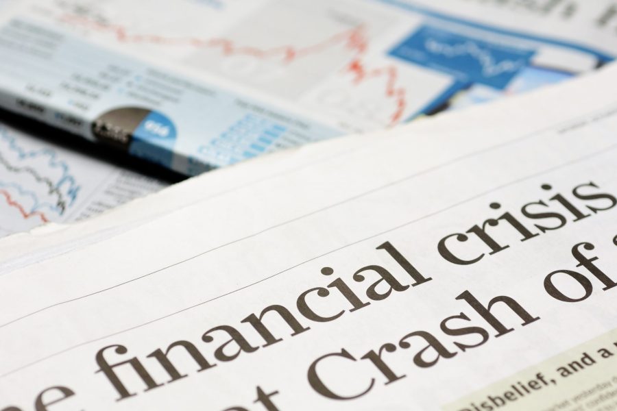 Close up of newspaper headline for financial crisis news