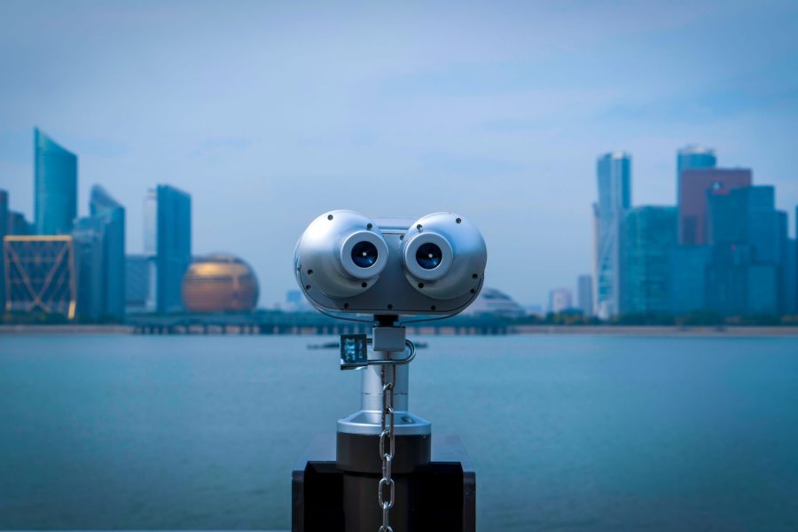 Binoculars look out over a city