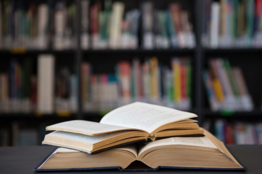 Close up of open books on table