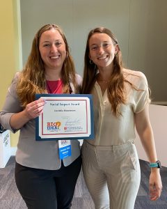 Co-founders of Cordelia Biosciences hold Social Impact Award.