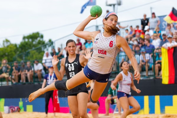 Christine Mansour lunges with a handball.
