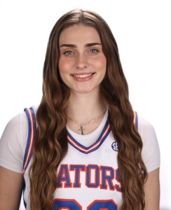 Paige Clausen in her basketball uniform