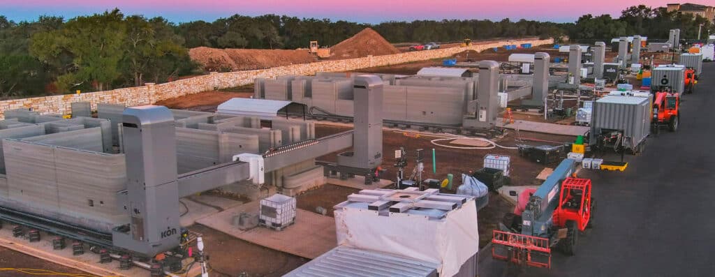 Concrete printers on site as several homes are being printed at the same time