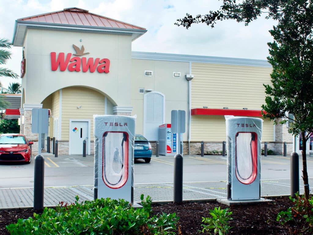 Tesla EV charging stations in a Wawa parking lot