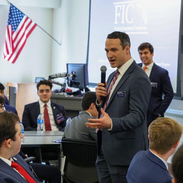 Maxim Dolinsky speaks to students during a session at the 2024 Florida Investment Conference, hosted by the University of Florida’s Warrington College of Business.