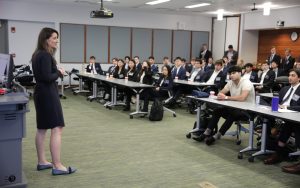 Gina Martin Adams speaks with students at the Florida Investment Conference.