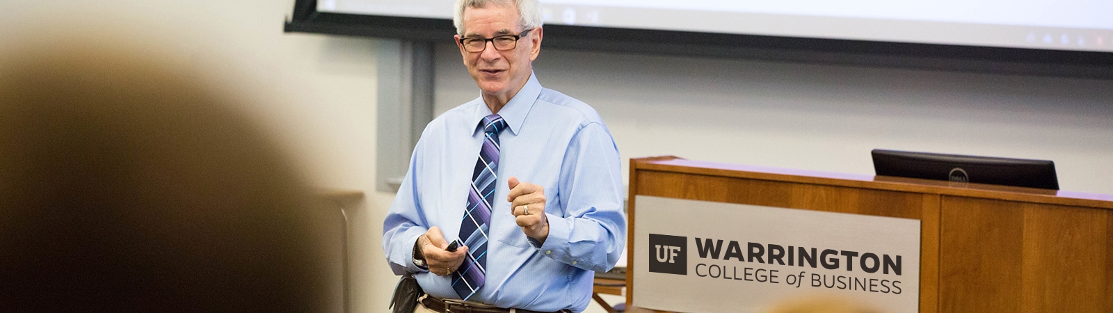 Dr. Wayne Archer speaking to a graduate class at the Warrington College of Business.