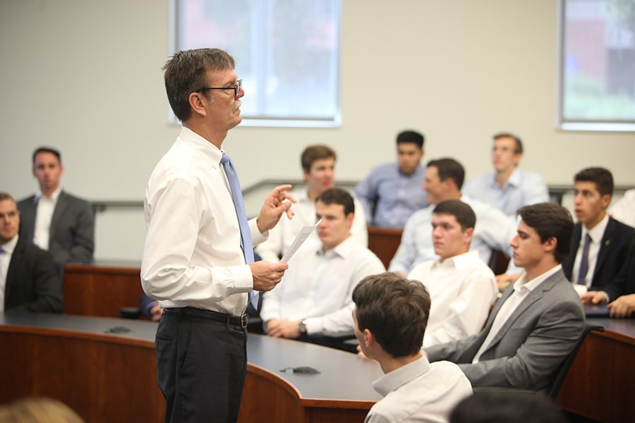 UF Warrington MS in Finance Instructor David T. Brown in front of a classroom