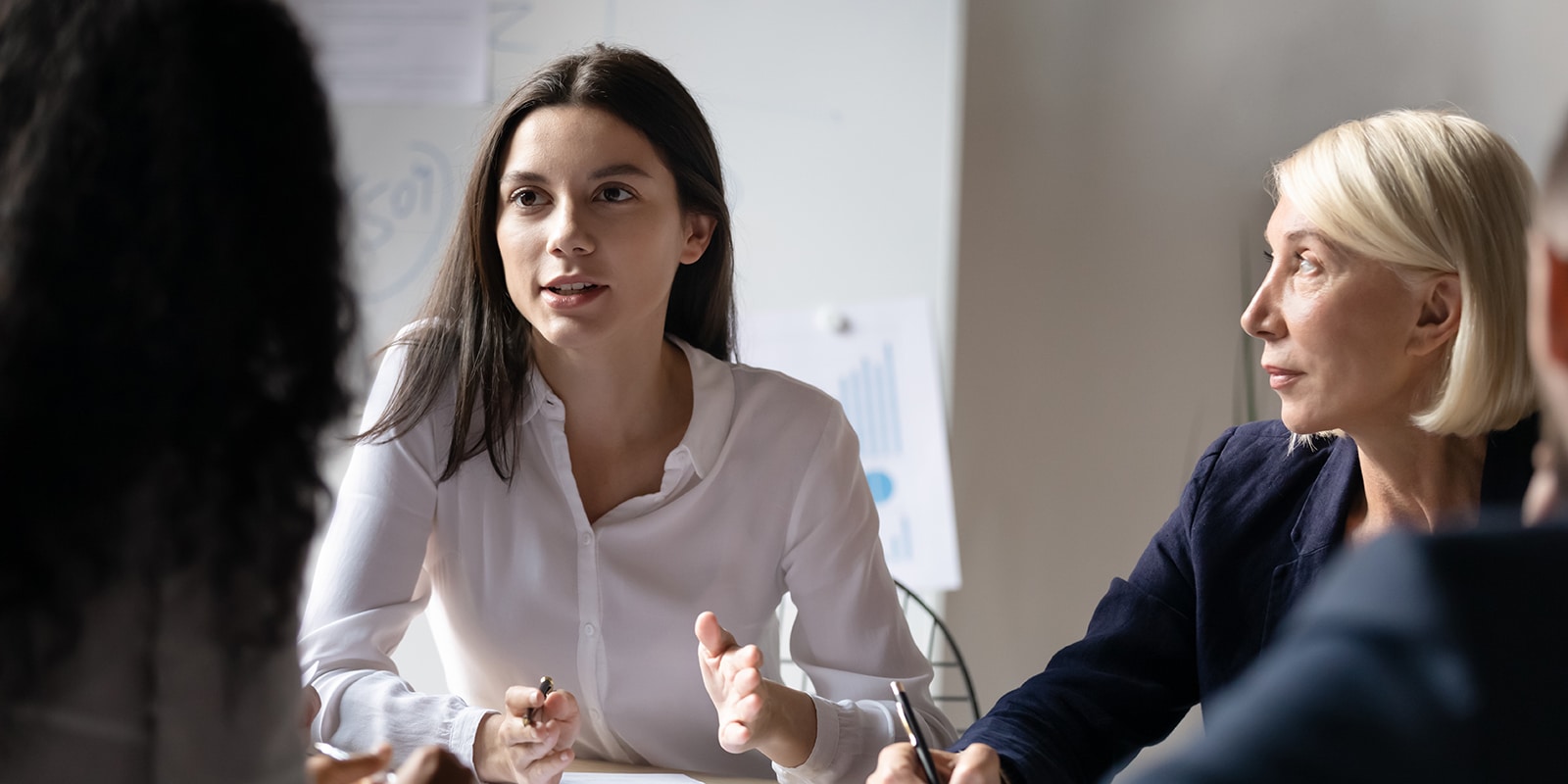 A student from UF Warrington's MS in ISOM - Information Technology program shares their ideas with a corporate partner during a session for a practicum project
