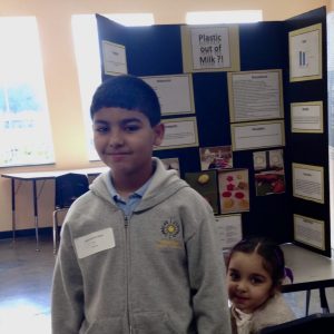 ignition packaging founder Abdurrahman Bejjaj at elementary science fair with his project