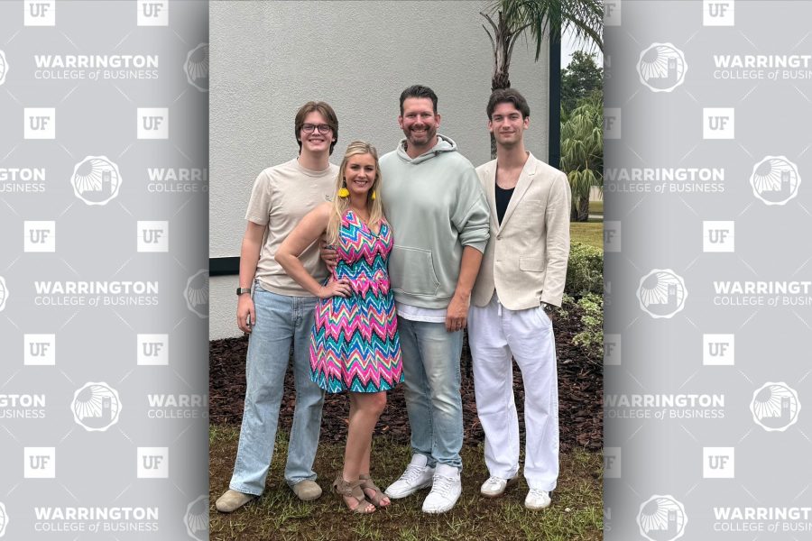 online mba student chris taylor with his wife and two children