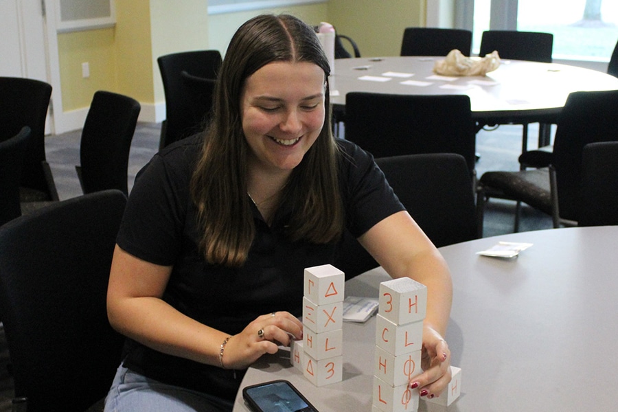 Student participating in an activity at an HLC event. 