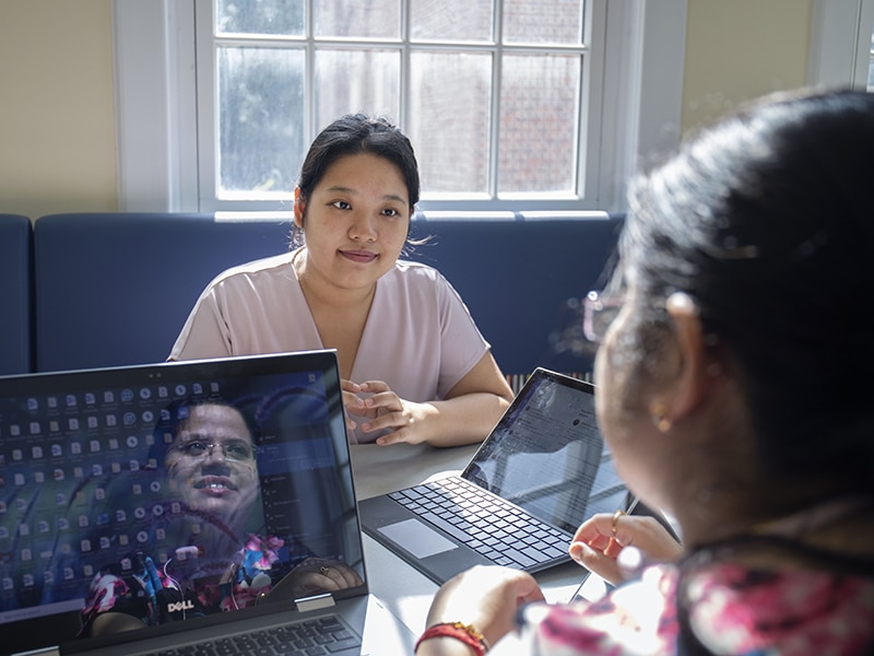 Two students in an advising session. 