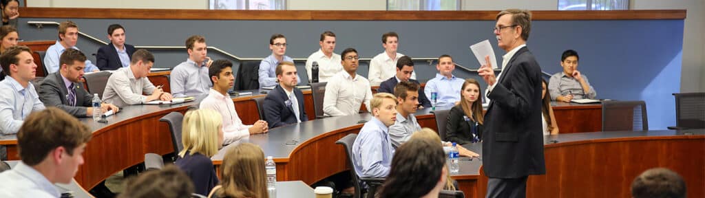 Students enrolled in the University of Florida Warrington College of Business' BSBA in Finance program listen to a faculty member during a lecture
