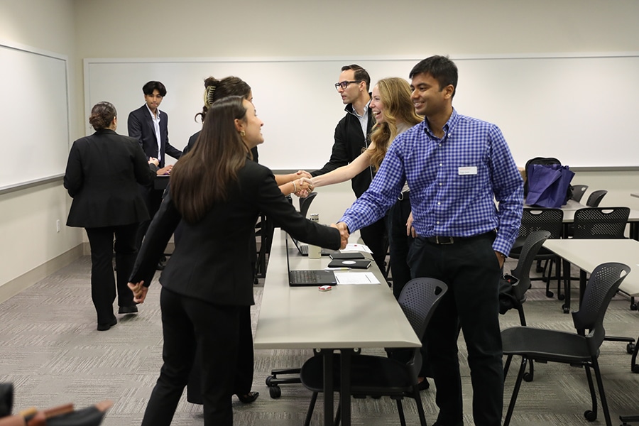 Students networking for internships. 
