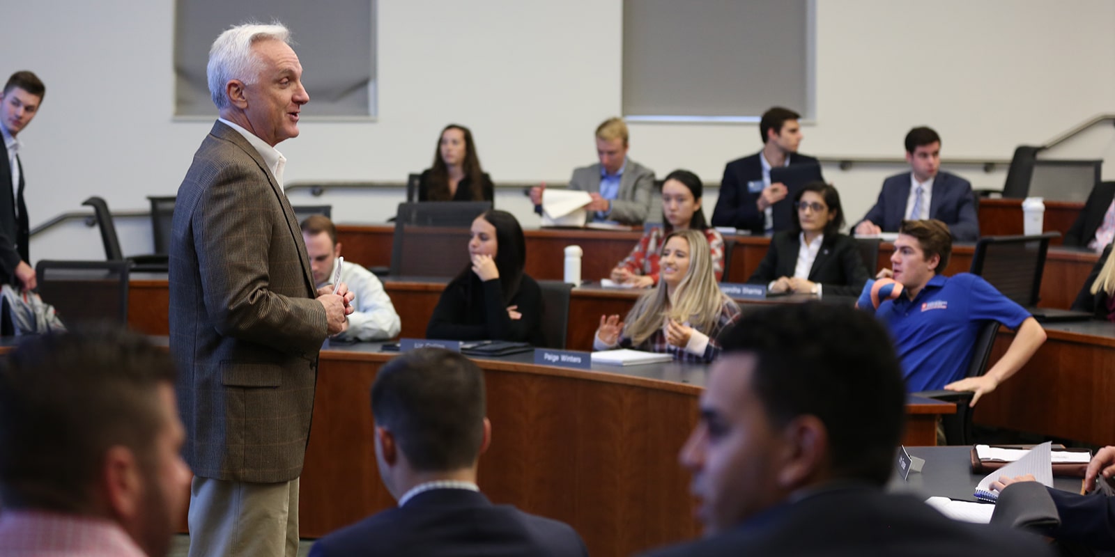 An industry professional talks to a class of UF Warrington MS in Real Estate students about careers in their field