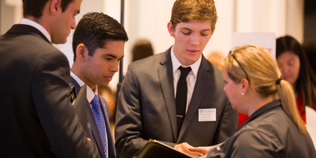 Students from UF Warrington's Online Bachelor's in Business Administration programs meet with recruiters at an on-campus job fair